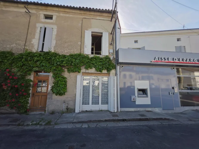 Charming Village House with Great Potential