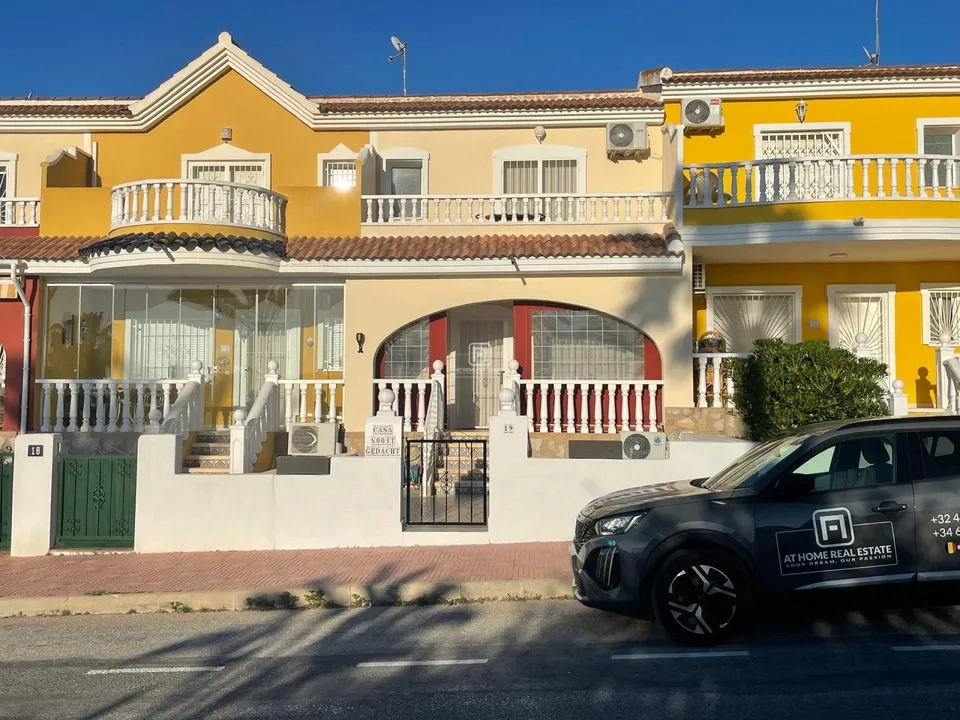AT HOME Real Estate