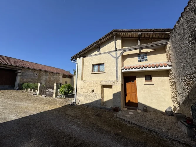 Pretty stone cottage with barn and garden