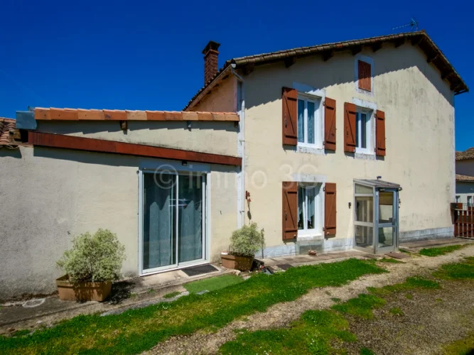 Two Renovated Stone Town Houses with Outbuildings and Garden