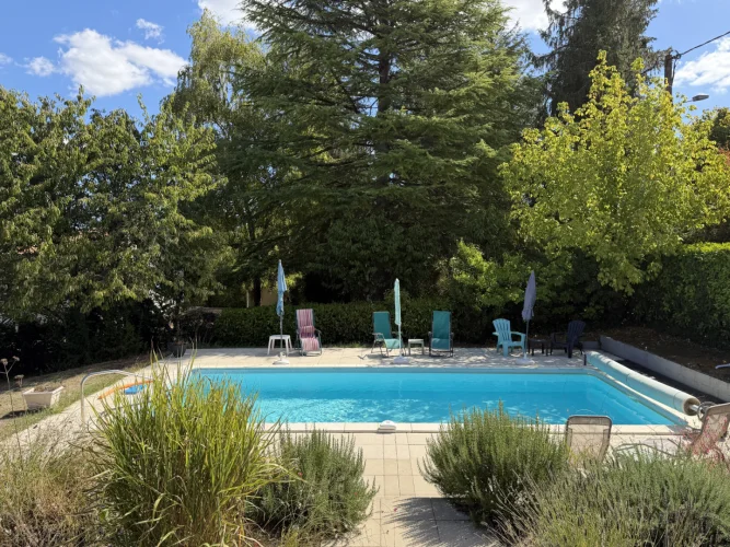 Four-Bedroom Village Property with Pool and Mature Gardens photo 2