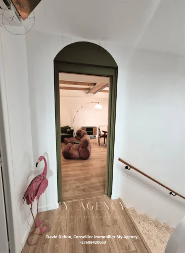 Renovated 3-Bedroom House with Two Large Garages and Attic with Potential
