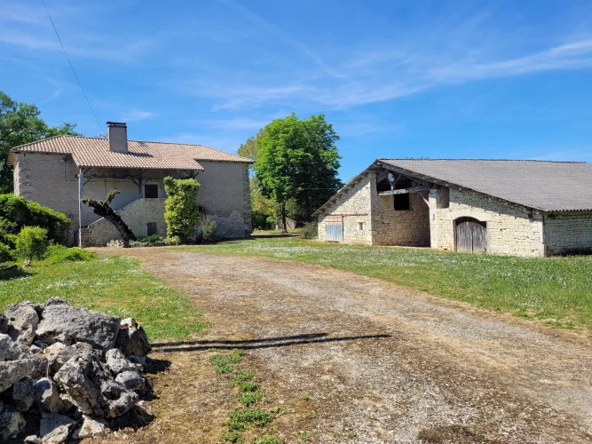 Former Family Stone Hamlet in Need of Renovation , Complete with Barns