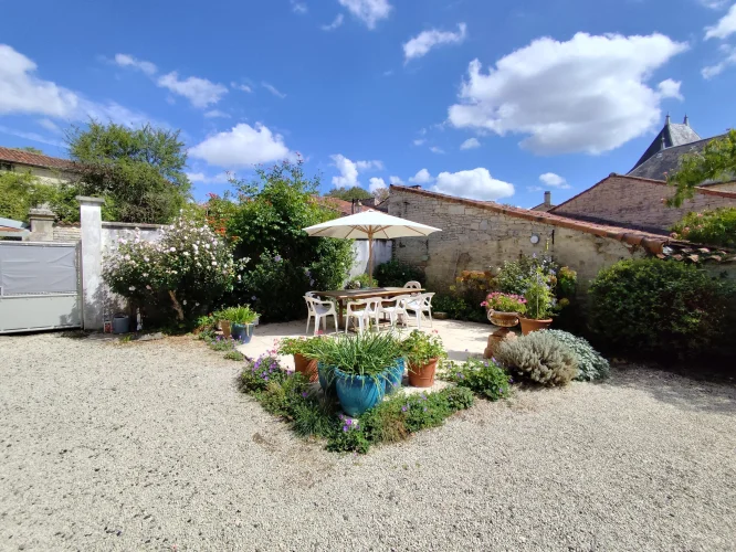 Pretty Four-Bedroom Village House with Large Garden and Barn in the Heart of Tusson photo 2