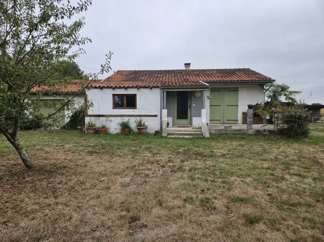 Compact Village Bungalow with Land