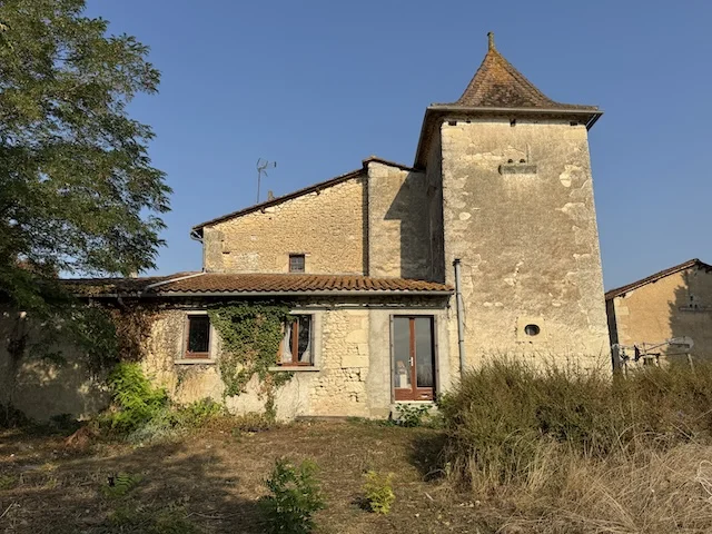Impressive stone house with large barn and garden