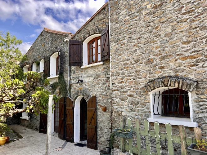 Charming Stone Village House with Garden and Garage Near Montolieu