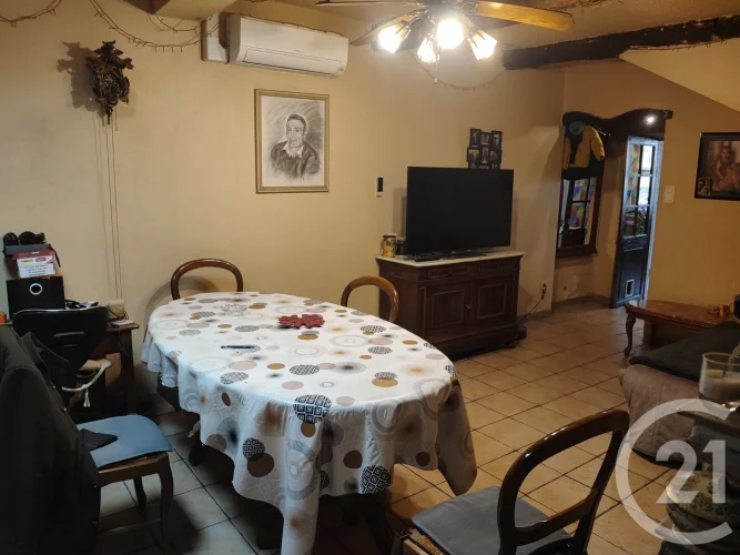 In Cesseras, 5 Minutes from Olonzac: Village House with a Garage and a Terrace with no Overlooking photo 3