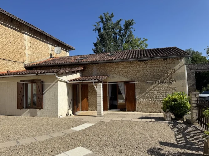 Pretty stone cottage with barn and garden photo 2