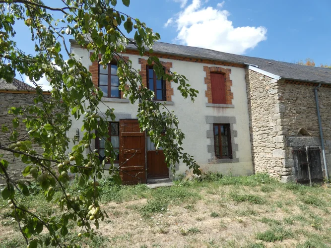 A Nice South Facing Stone House with Attached Barn and Attached Garden.