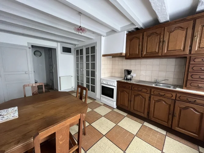 A Practical Village House - for Investment or Living photo 3