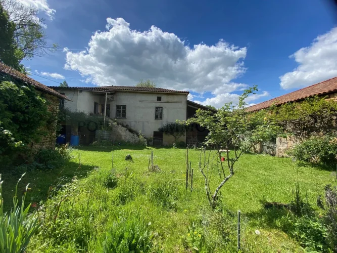 Nice Stone Property Including a Main House, a Separate Apartment, a Large Stone Barn, and Outbuildings, all Set on a Bea…