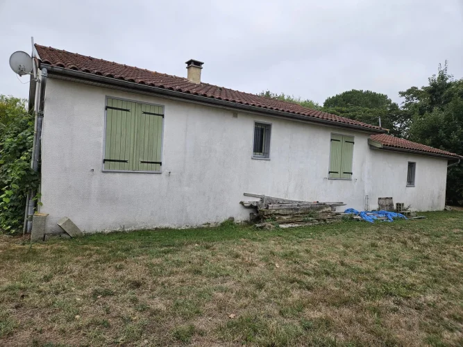 Compact Village Bungalow with Land photo 2