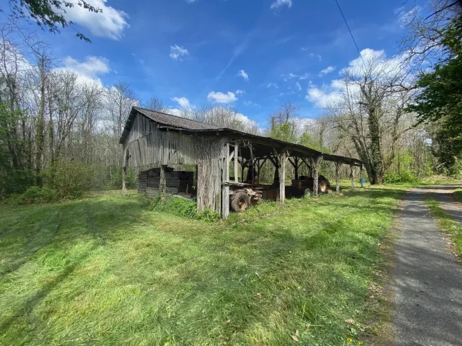 Nice Stone Property Including a Main House, a Separate Apartment, a Large Stone Barn, and Outbuildings, all Set on a Bea… photo 3