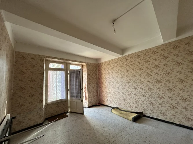 On the Promenade in Alzonne, a 65m² Village House to Renovate photo 2
