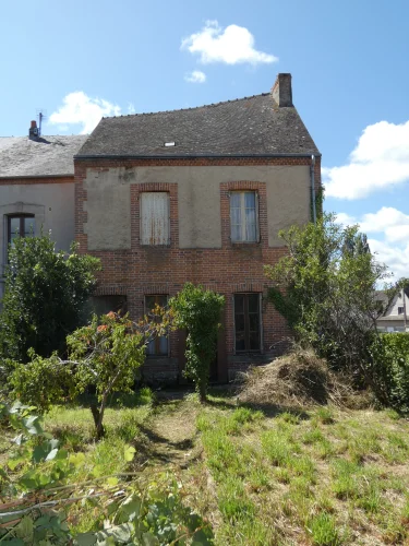 A Nice and Airy Village House with a Small Garden to the Rear.