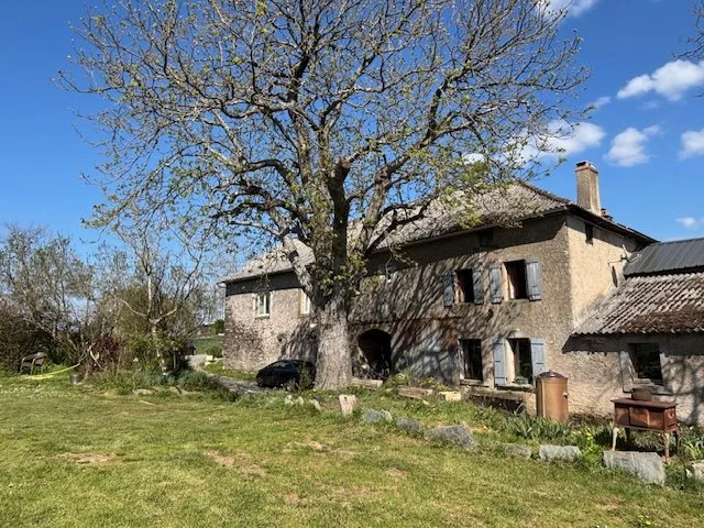 Stone House with Garden and Outbuildings