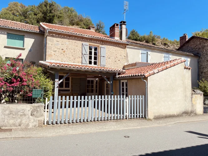 In the Heart of a Tourist Village, a Charming Renovated Char