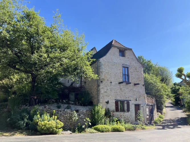 Village House with Gite, Separate Stone Barn and Garden in the Centre of a Pretty Village