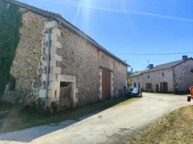 Two Adjoining Stone Houses with Barn and Well in the Heart of Maisonnais-Sur-Tardoire photo 2