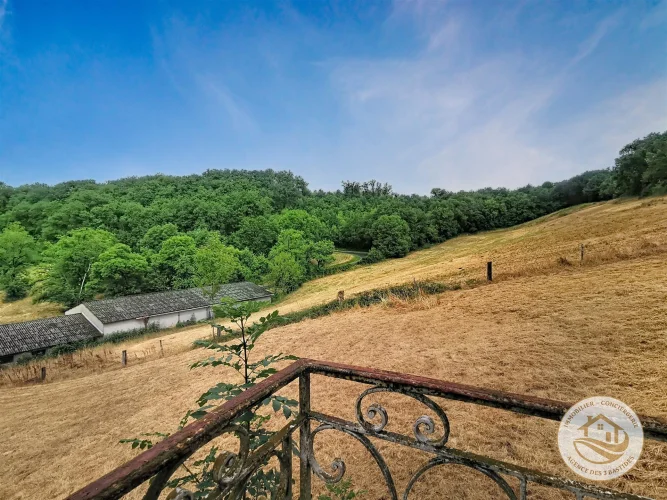 A Charming House with 1.89 ha of Meadowland, Outbuildings and Unobstructed Views of the Forest photo 3
