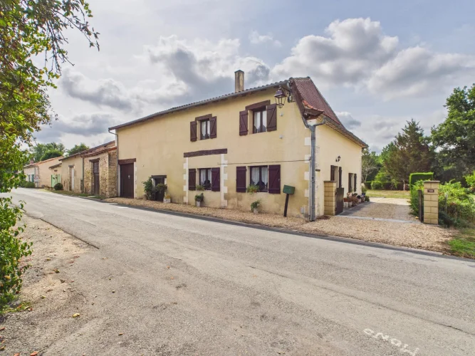 Charming Village House with Attached Barn and Garden