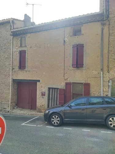 In Cesseras, 5 Minutes from Olonzac: Village House with a Garage and a Terrace with no Overlooking