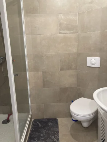 In Lagnieu, in the Town Center, a Building with Two 2-Bedroom Apartments. photo 4