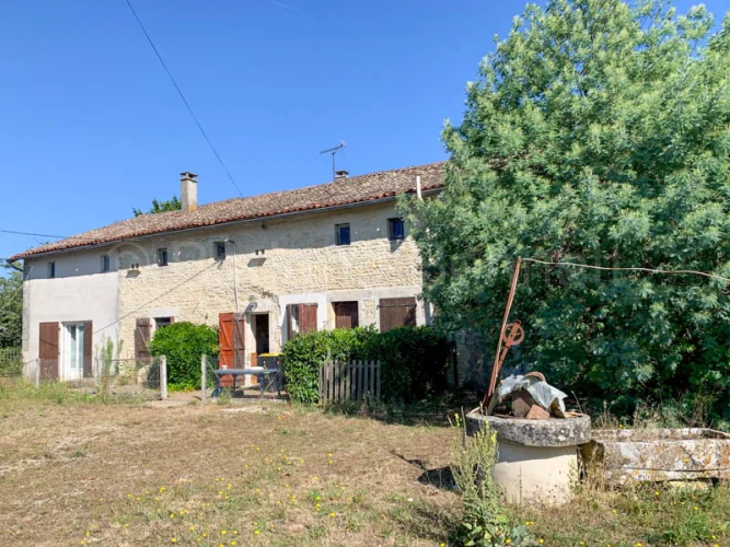 Pretty Stone Property to Renovate with Barns + Garden