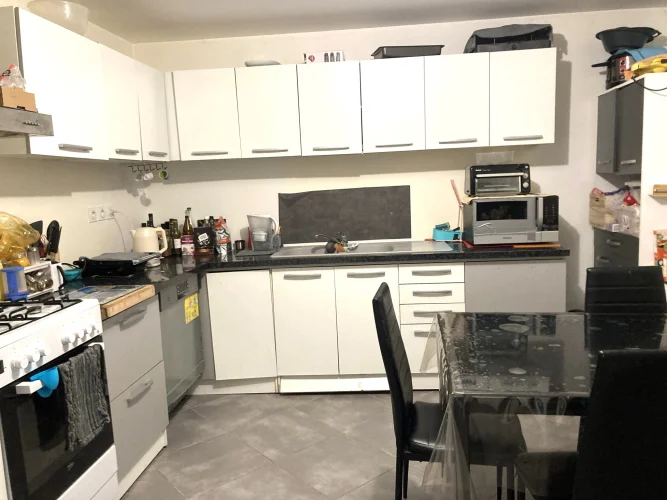 In Lagnieu, in the Town Center, a Building with Two 2-Bedroom Apartments. photo 5